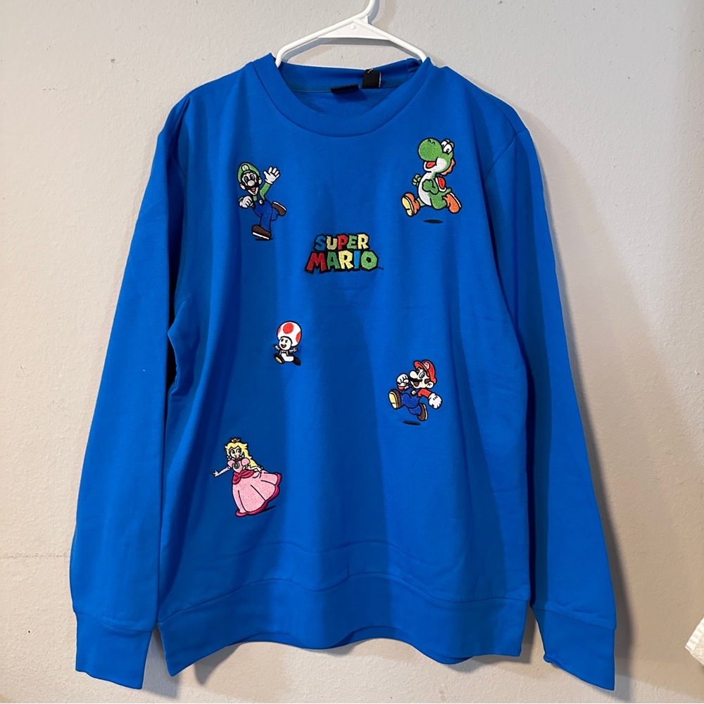 Brand New Mario Bros Box Lunch sweater.